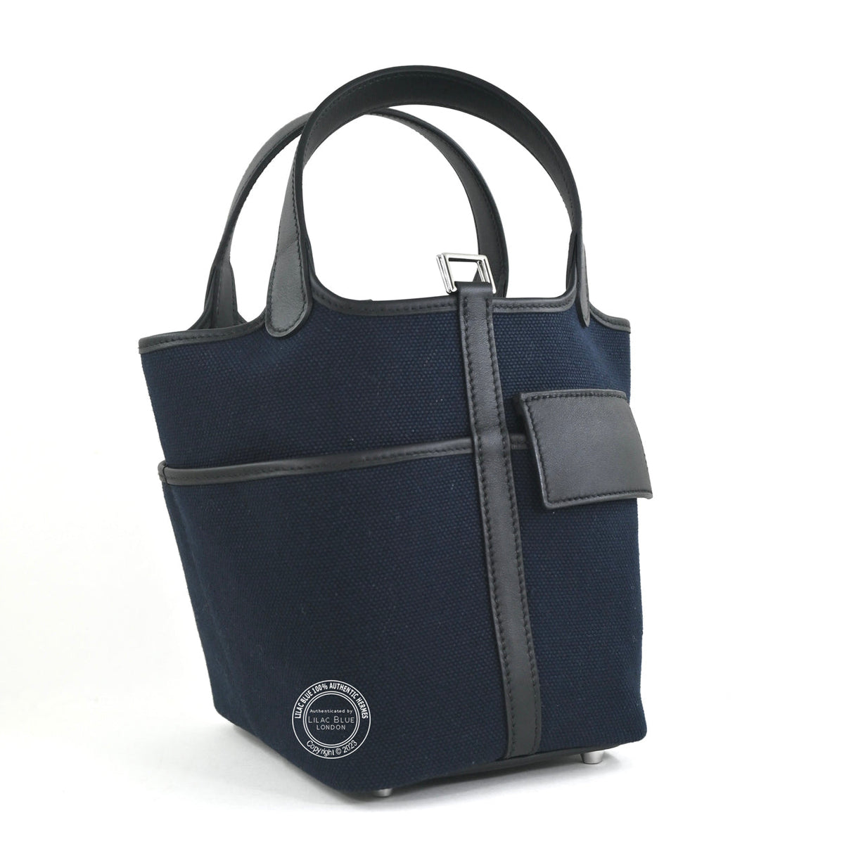 Hermès Picotin 18 Cargo in Bleu Marine Toile Goeland canvas with Black Swift leather trim, angled side view