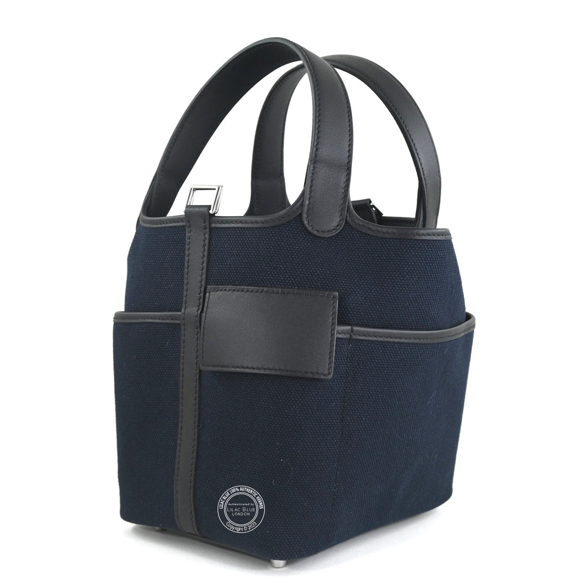 Hermès Picotin 18 Cargo in Bleu Marine Toile Goeland canvas with Black Swift leather trim, side view showing exterior pocket