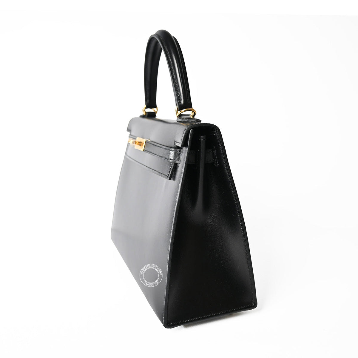 Hermès Kelly 25 in Black Box calfskin leather with gold hardware, side profile view