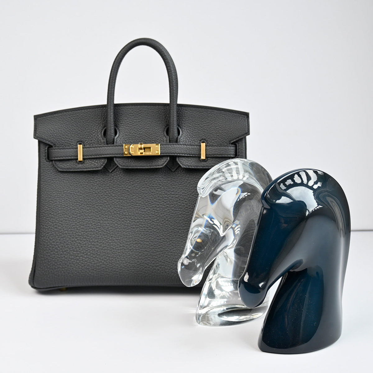 Hermès Birkin 25 in Plomb Togo leather with gold hardware, styled view